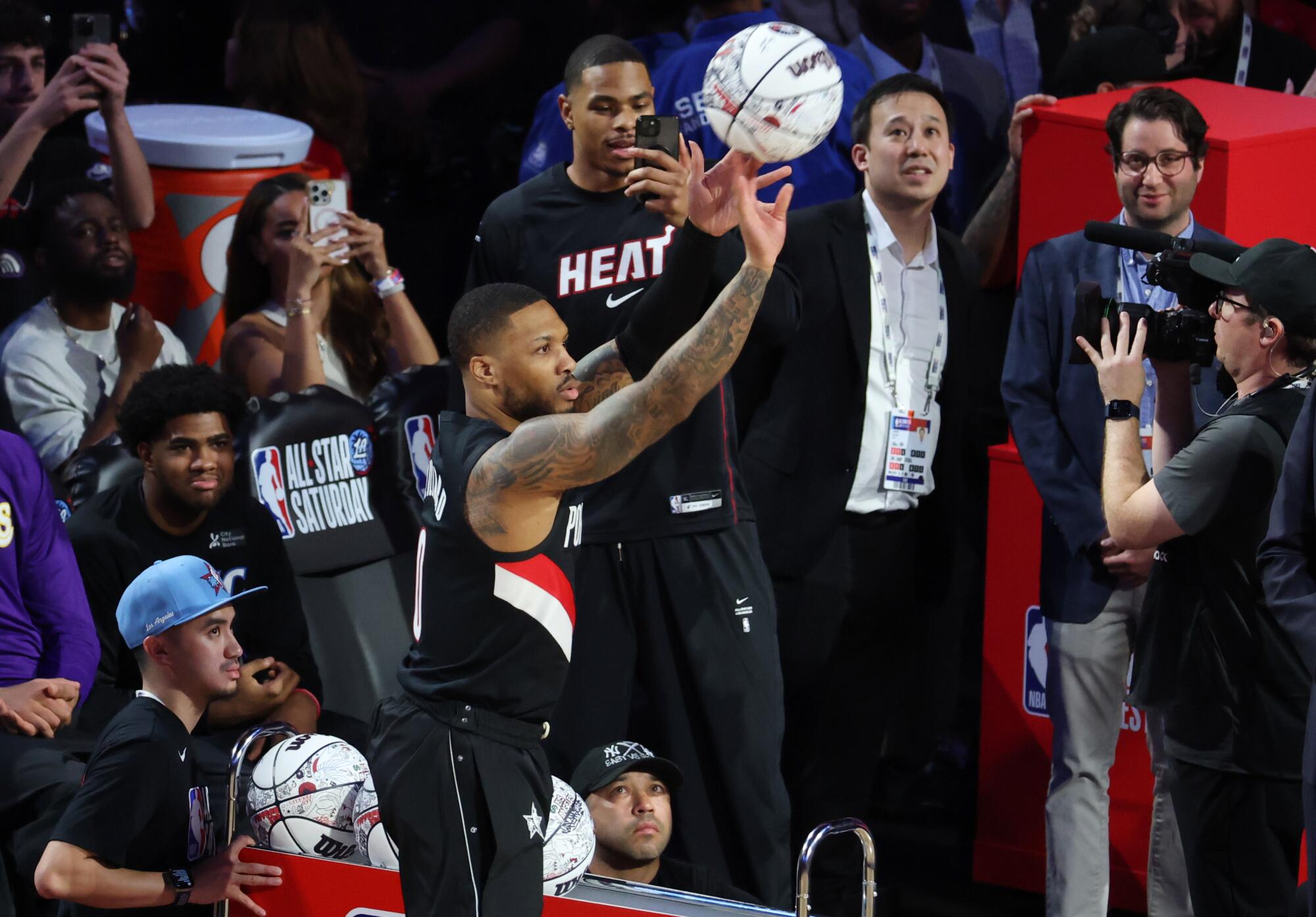 The Trail Blazers' Damian Lillard competes in the NBA all-star three point contest on Saturday at the Intuit Dome.