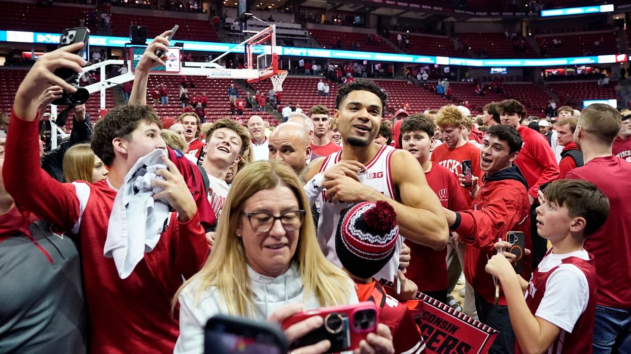 No. 24 Wisconsin moves back into Top 25 by displaying a knack for beating Big Ten's best teams