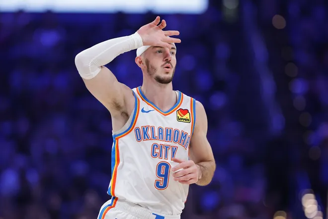 Feb 12, 2026; Oklahoma City, Oklahoma, USA; Oklahoma City Thunder guard Alex Caruso (9) gestures after scoring a three point basket against the Milwaukee Bucks during the first half at Paycom Center. Mandatory Credit: Alonzo Adams-Imagn Images