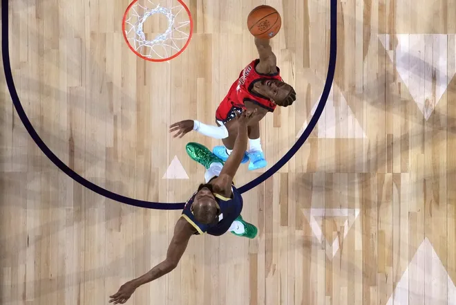 Feb 15, 2026; Inglewood, California, USA; Team USA Stars guard Tyrese Maxey (0) of the Philadelphia 76ers shoots against Team USA Stripes forward Kevin Durant (7) of the Houston Rockets in the championship game during the 75th NBA All Star Game at Intuit Dome.