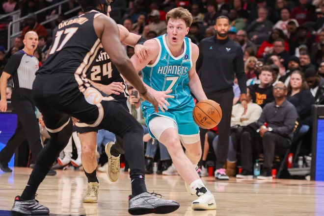 Feb 7, 2026; Atlanta, Georgia, USA; Charlotte Hornets guard Kon Knueppel (7) drives to the basket against the Atlanta Hawks in the fourth quarter at State Farm Arena. Mandatory Credit: Brett Davis-Imagn Images