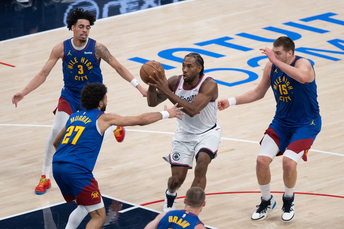 Los Angeles Clippers guard Kawhii Leonard (2) drives through 3 defenders during a game between the Los Angeles Clippers and the Denver Nuggets on Thursday, February 19,2026 at Intuit Dome in Inglewood Calif