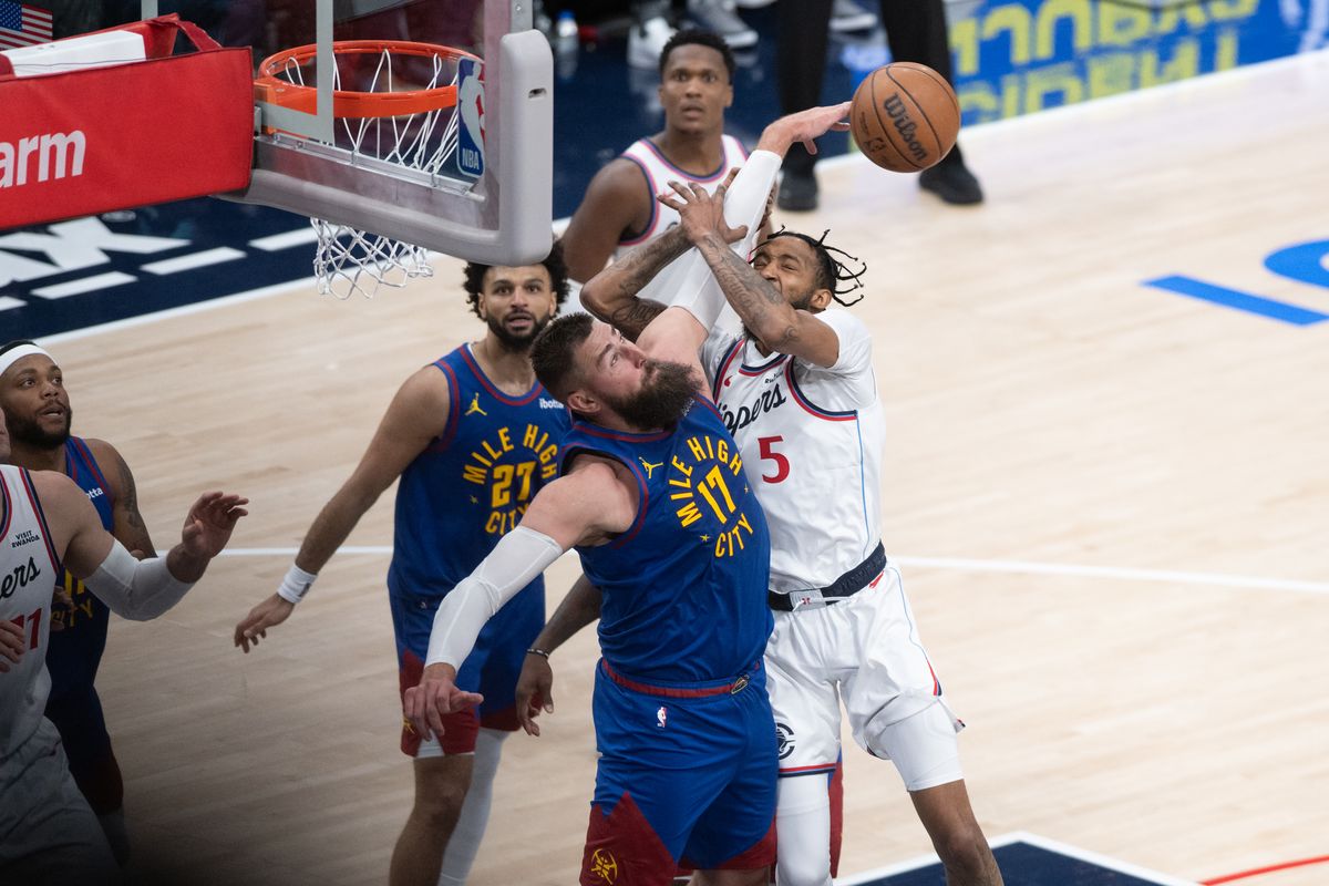 Los Angeles Clippers forward Derrick Jones Jr (5) takes a hard foul during a game between the Los Angeles Clippers and the Denver Nuggets on Thursday, February 19,2026 at Intuit Dome in Inglewood Calif
