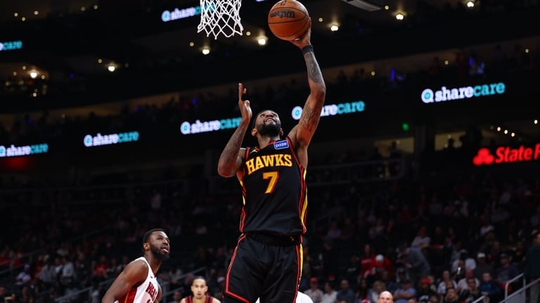 Atlanta Hawks guard Nickeil Alexander-Walker (7) shoots against Miami Heat...