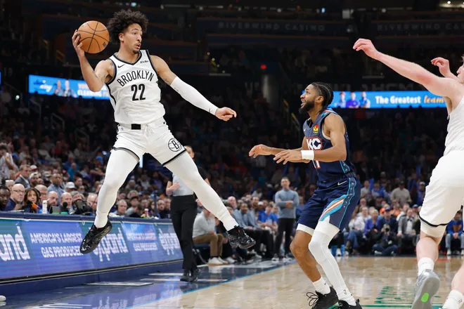 Feb 20, 2026; Oklahoma City, Oklahoma, USA; Brooklyn Nets forward Jalen Wilson (22) leaps to save the ball from going out of bounds against the Oklahoma City Thunder during the second half at Paycom Center. Mandatory Credit: Alonzo Adams-Imagn Images