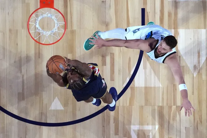 Feb 15, 2026; Inglewood, California, USA; Team USA Stripes forward Kawhi Leonard (2) of the LA Clippers shoots against Team World center Alperen Sengun (28) of the Houston Rockets in game three during the 75th NBA All Star Game at Intuit Dome.