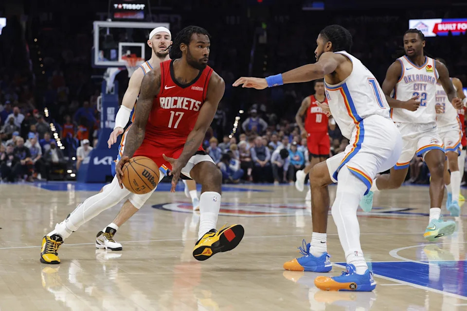 Feb 7, 2026; Oklahoma City, Oklahoma, USA; Houston Rockets forward Tari Eason (17) drives to the basket as Oklahoma City Thunder guard Isaiah Joe (11) defends during the second half at Paycom Center. Mandatory Credit: Alonzo Adams-Imagn Images