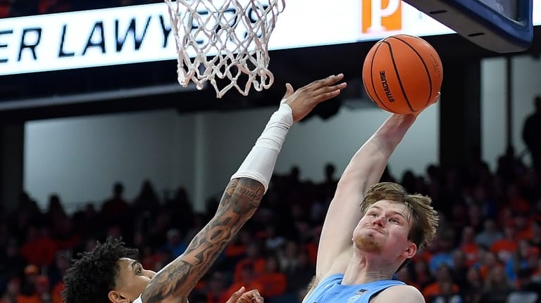 North Carolina center Henri Veesaar (13) drives to the basket...