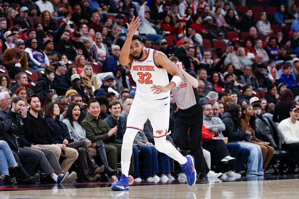 Knicks center Karl-Anthony Towns (32) celebrates after scoring against the Chicago Bulls during the first half at United Center. Kamil Krzaczynski-Imagn Images