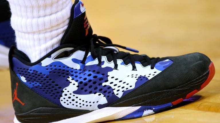 Los Angeles Clippers guard Chris Paul's shoes are seen during...