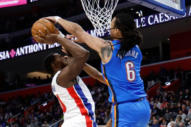 Feb 25, 2026; Detroit, Michigan, USA; Oklahoma City Thunder forward Jaylin Williams (6) blocks a shot by Detroit Pistons center Jalen Duren (0) in the first half at Little Caesars Arena. Mandatory Credit: Rick Osentoski-Imagn Images