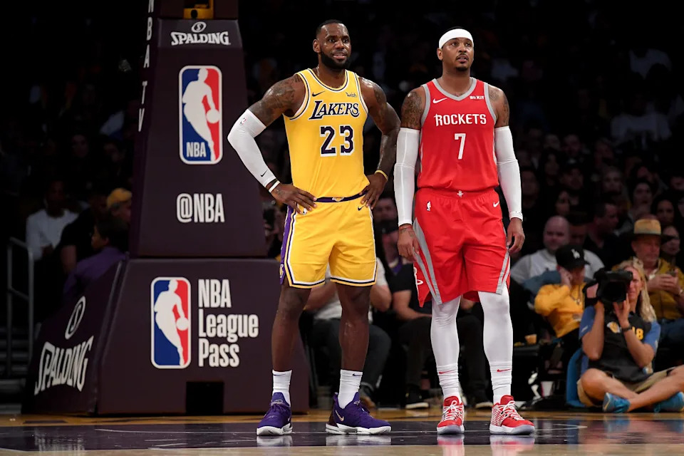 LOS ANGELES, CA - OCTOBER 20: LeBron James #23 of the Los Angeles Lakers and Carmelo Anthony #7 of the Houston Rockets wait for and inbound at Staples Center on October 20, 2018 in Los Angeles, California. (Photo by Harry How/Getty Images)