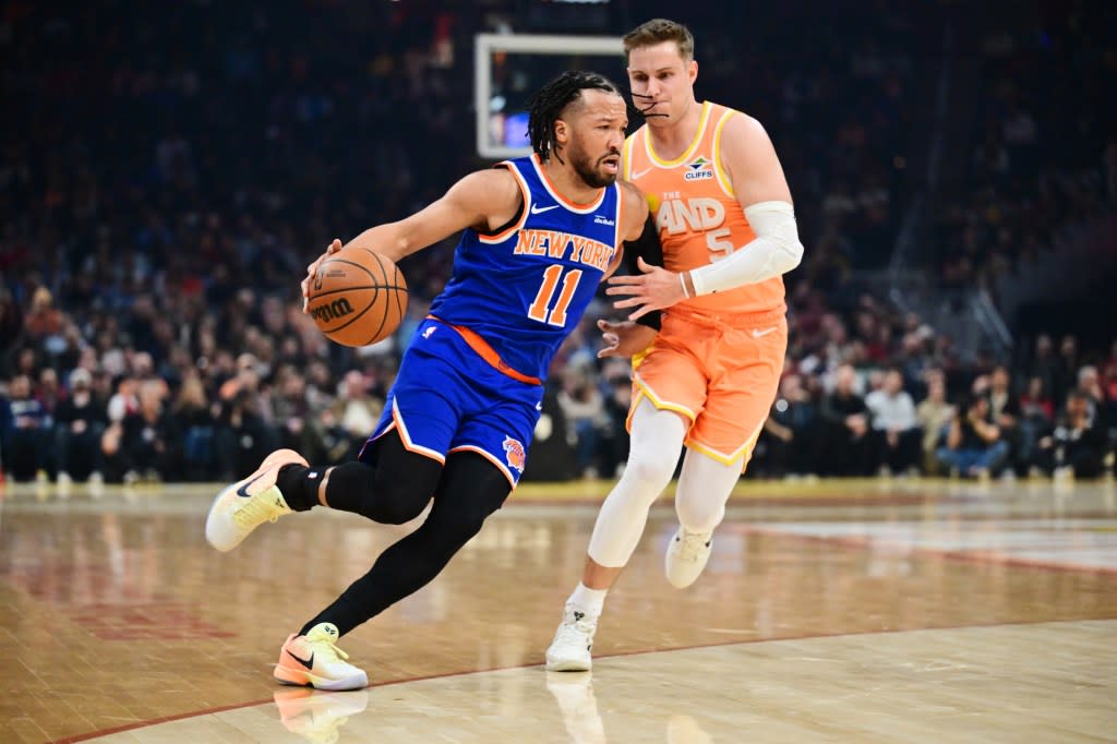 Jalen Brunson drives past Sam Merrill (5) during the first half of the Knicks’ loss to the Cavaliers in Cleveland. Ken Blaze-Imagn Images