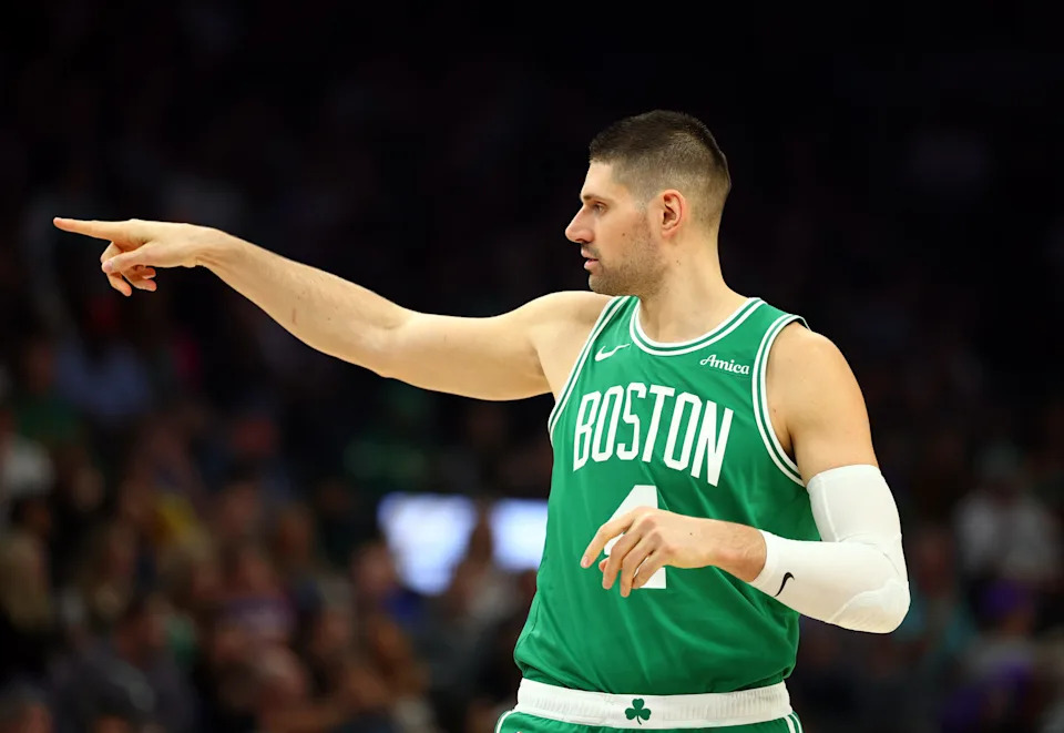 Feb 24, 2026; Phoenix, Arizona, USA; Boston Celtics center Nikola Vucevic (4) reacts against the Phoenix Suns in the first half at Mortgage Matchup Center. Mandatory Credit: Mark J. Rebilas-Imagn Images