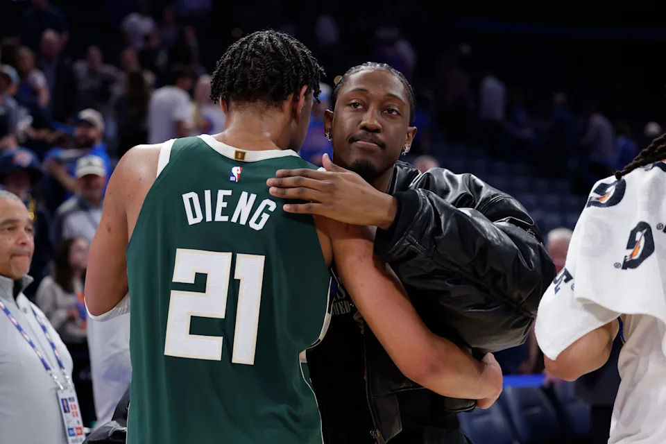 Feb 12, 2026; Oklahoma City, Oklahoma, USA; Oklahoma City Thunder guard/forward Jalen Williams (8) hugs former teammate Milwaukee Bucks forward Ousmane Dieng (21) at the end of their game at Paycom Center. Mandatory Credit: Alonzo Adams-Imagn Images