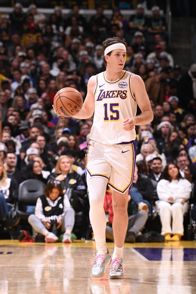 Austin Reaves of the Los Angeles Lakers handles the ball.