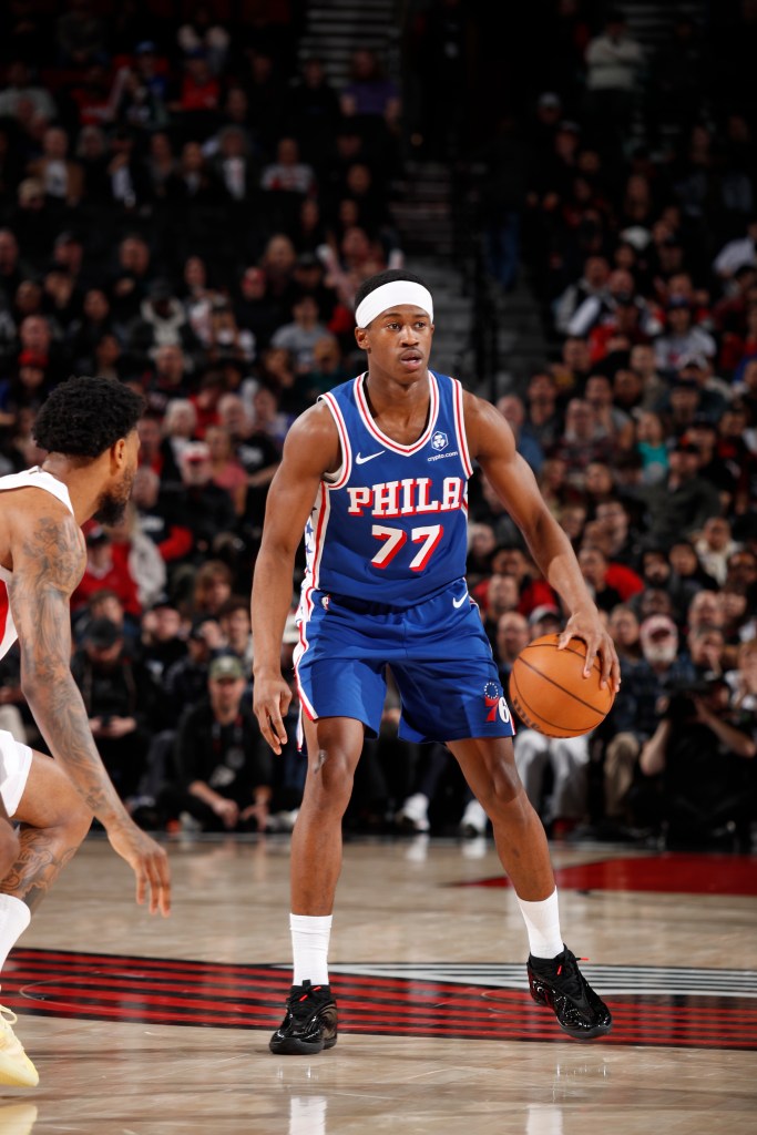 VJ Edgecombe holds the basketball and scans the court.