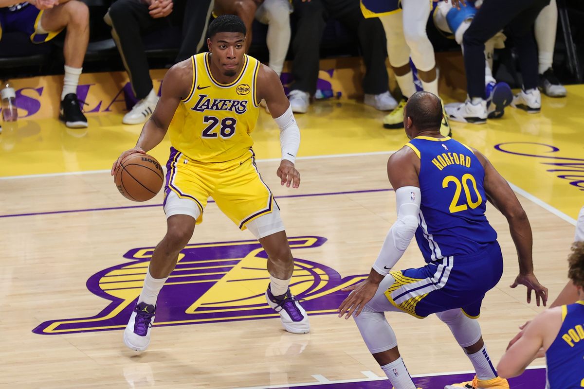 Los Angeles Lakers forward Rui Hachimura (28) dribbles the basketball during an NBA game against the Golden State Warriors on February 7, 2025 in Los Angeles, CA.