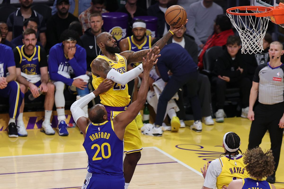 Los Angeles Lakers forward LeBron James (23) attempts a lay up during an NBA game against the Golden State Warriors on February 7, 2025 in Los Angeles, CA.
