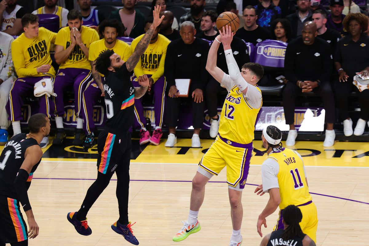 Los Angeles Lakers forward Jake LaRavia (12) shoots the basketball during an NBA game against the San Antonio Spurs on February 10, 2026 in Los Angeles, CA.