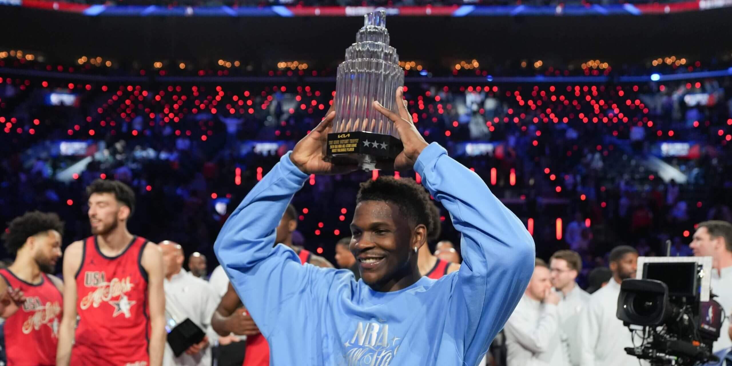 Anthony Edwards holds his NBA All-Star Game Most Valuable Player trophy