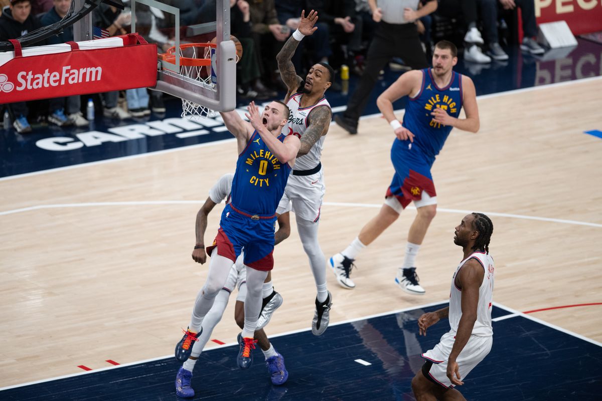 Denver Nuggets guard Christian Braun (0) attempts a layup during a game between the Los Angeles Clippers and the Denver Nuggets on Thursday, February 19,2026 at Intuit Dome in Inglewood Calif