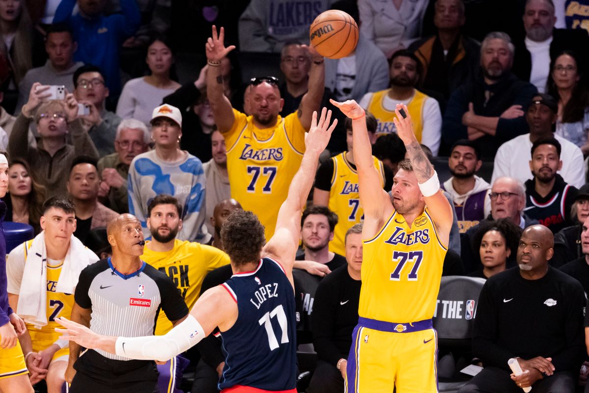 Luka Doncic #77 of the Los Angeles Lakers shoots a three pointer during an NBA basketball game against the LA Clippers, Friday February 20, 2026 in Los Angeles, Calif.