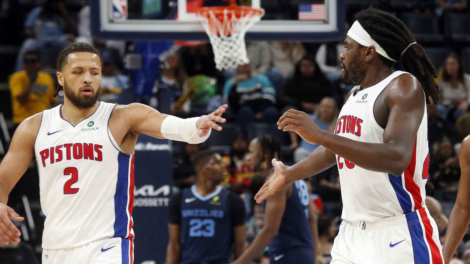 Detroit Pistons guard Cade Cunningham (2) reacts with forward Isaiah Stewart (28) during the fourth quarter against the Memphis Grizzlies at FedExForum. 