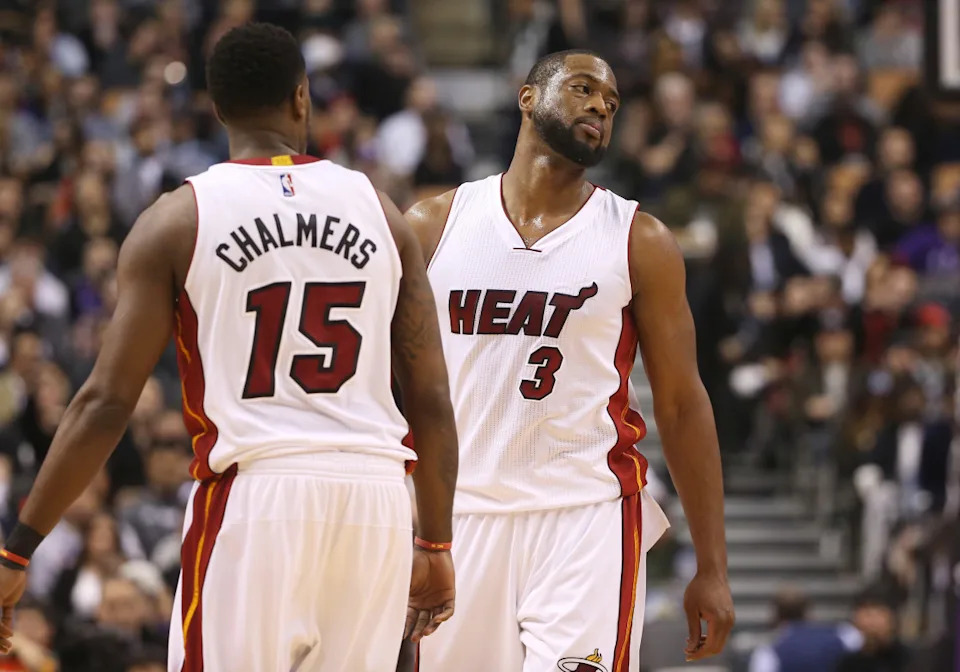 Former NBA players Dwyane Wade and Mario Chalmers played together on the Miami Heat.Tom Szczerbowski-Imagn Images