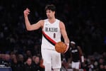 Portland Trail Blazers' Deni Avdija (8) looks to pass during the second half of an NBA basketball game against the New York Knicks Friday, Jan. 30, 2026, in New York.