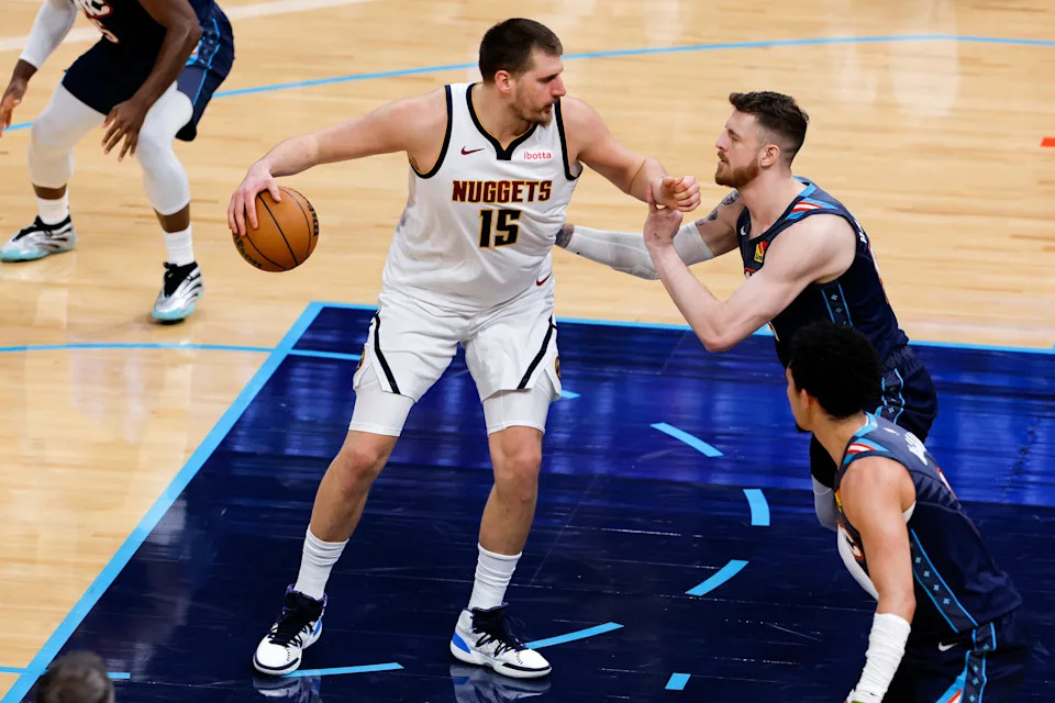 Feb 27, 2026; Oklahoma City, Oklahoma, USA; Denver Nuggets center Nikola Jokić (15) drives against Oklahoma City Thunder center/forward Isaiah Hartenstein (55) during the second quarter at Paycom Center. Mandatory Credit: Alonzo Adams-Imagn Images
