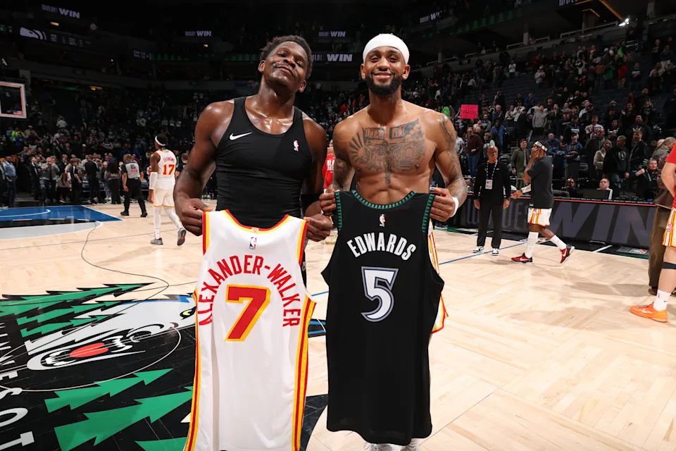 MINNEAPOLIS, MN – FEBRUARY 9: Anthony Edwards #5 of the Minnesota Timberwolves and Nickeil Alexander-Walker #7 of the Atlanta Hawks swap jerseys after the game on February 9, 2026 at Target Center in Minneapolis, Minnesota. NOTE TO USER: User expressly acknowledges and agrees that, by downloading and or using this Photograph, user is consenting to the terms and conditions of the Getty Images License Agreement. Mandatory Copyright Notice: Copyright 2026 NBAE (Photo by David Sherman/NBAE via Getty Images) | NBAE via Getty Images