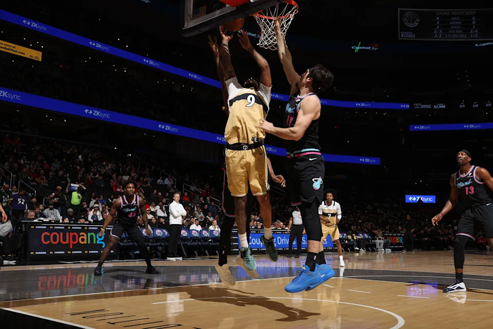 Justin Champagnie drives against the Miami Heat. | NBAE via Getty Images