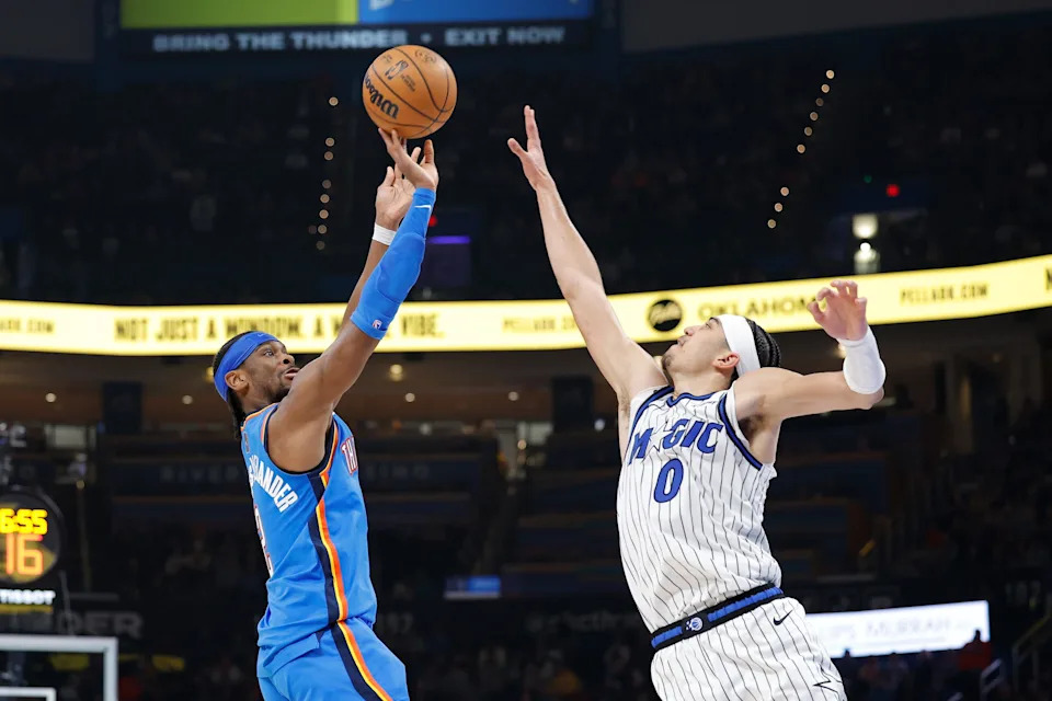 Feb 3, 2026; Oklahoma City, Oklahoma, USA; Oklahoma City Thunder guard Shai Gilgeous-Alexander (2) shoots as Orlando Magic guard Anthony Black (0) during the second half at Paycom Center. Mandatory Credit: Alonzo Adams-Imagn Images