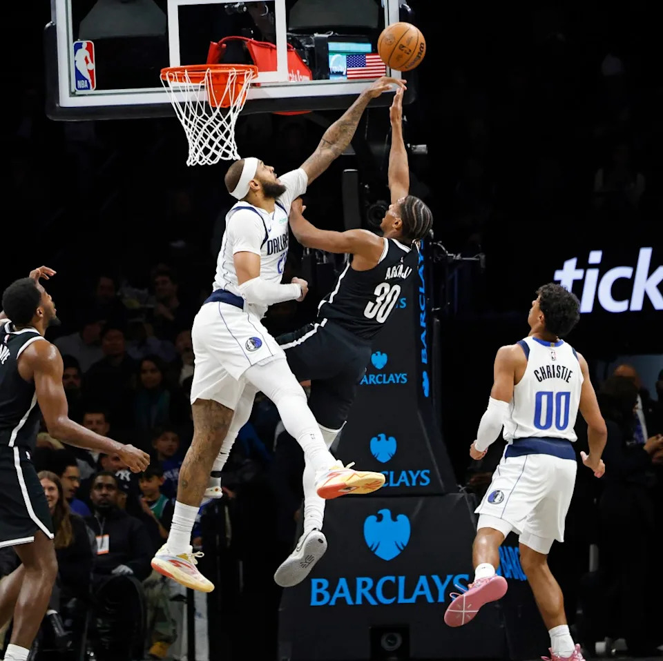 Brooklyn Nets Ochai Agbaji puts up a shot as Daniel Gafford of the Dallas Mavericks blocks during the second half on February 24, 2026 at Barclays Center in Brooklyn, NY. Robert Sabo for NY Post