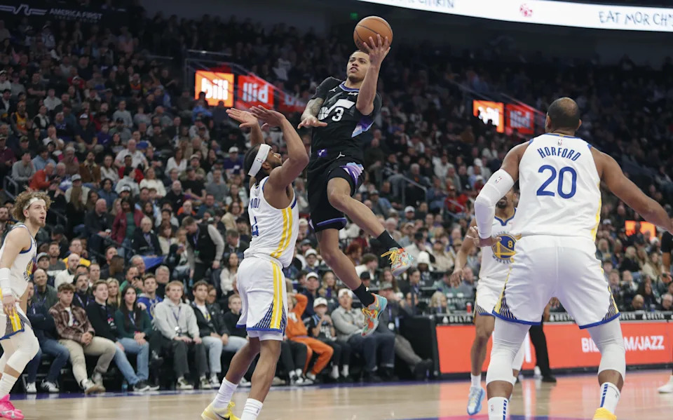 SALT LAKE CITY, UT – JANUARY 28: Keyonte George #3 of the Utah Jazz goes to the basket against Moses Moody #4 of the Golden State Warriors during the second half of their game at the Delta Center on January 28, 2026 in Salt Lake City, Utah. NOTE TO USER: User expressly acknowledges and agrees that, by downloading and or using this photograph, User is consenting to the terms and conditions of the Getty Images License Agreement. (Photo by Chris Gardner/Getty Images) | Getty Images