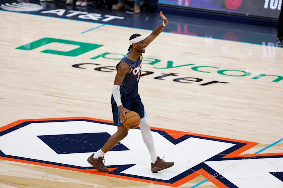 Feb 27, 2026; Oklahoma City, Oklahoma, USA; Oklahoma City Thunder guard Shai Gilgeous-Alexander (2) gestures to his team as he dribbles down the court against the Denver Nuggets during the fourth quarter at Paycom Center. Mandatory Credit: Alonzo Adams-Imagn Images