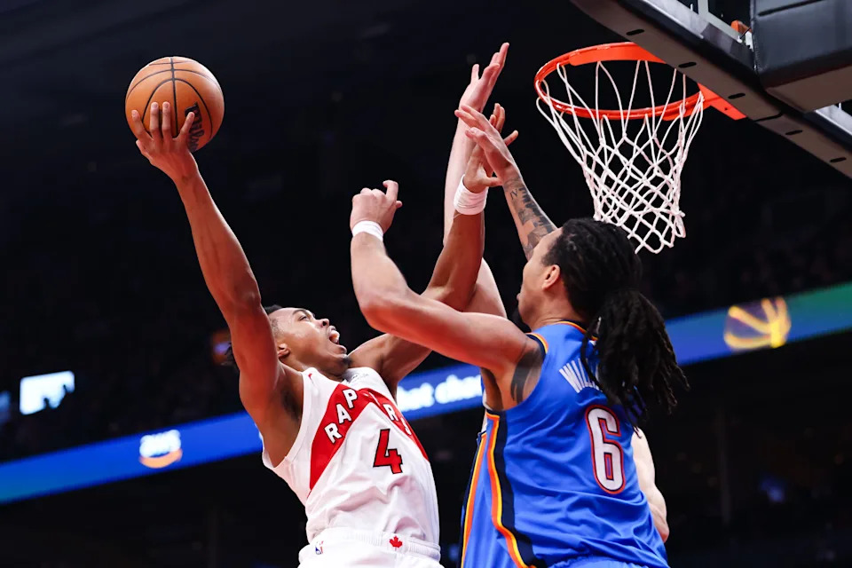 TORONTO, CANADA - FEBRUARY 24: Scottie Barnes #4 of the Toronto Raptors drives to the net against Jaylin Williams #6 of the Oklahoma City Thunder during the first half of their NBA game at Scotiabank Arena on February 24, 2026 in Toronto, Ontario, Canada. NOTE TO USER: User expressly acknowledges and agrees that, by downloading and or using this photograph, User is consenting to the terms and conditions of the Getty Images License Agreement. (Photo by Cole Burston/Getty Images)