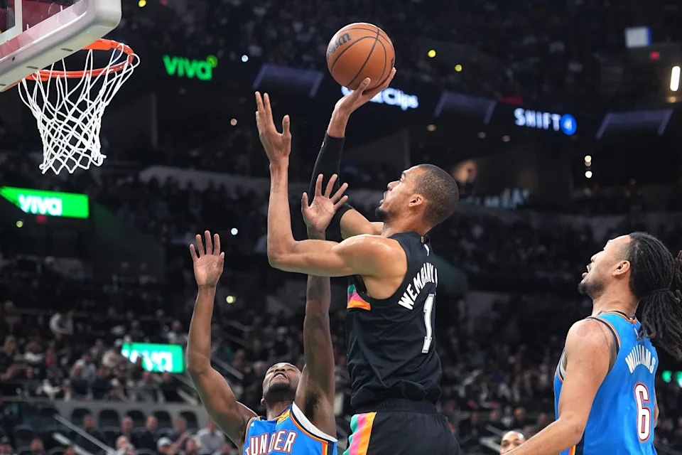 Feb 4, 2026; San Antonio, Texas, USA; San Antonio Spurs forward Victor Wembanyama (1) shoots during the first half against the Oklahoma City Thunder at Frost Bank Center. Mandatory Credit: Scott Wachter-Imagn Images