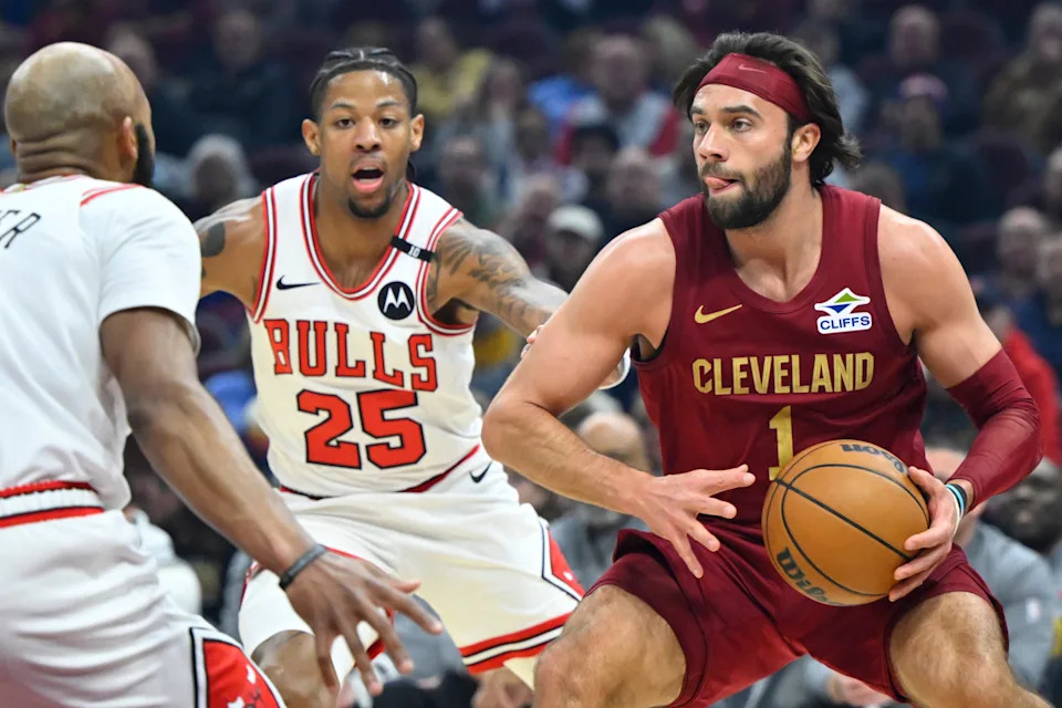Apr 8, 2025; Cleveland, Ohio, USA; Cleveland Cavaliers guard Max Strus (1) looks to pass beside Chicago Bulls forward Dalen Terry (25) in the first quarter at Rocket Arena. Mandatory Credit: David Richard-Imagn Images