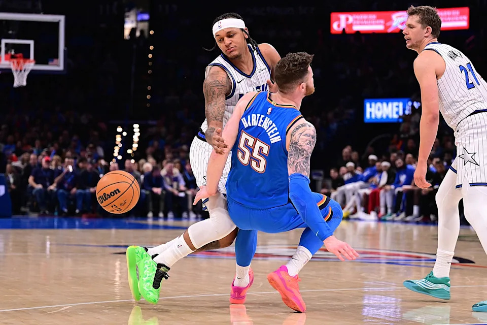 OKLAHOMA CITY, OKLAHOMA - FEBRUARY 3: Paolo Banchero #5 of the Orlando Magic runs in to Isaiah Hartenstein #55 of the Oklahoma City Thunder during the second half at Paycom Center on February 3, 2026 in Oklahoma City, Oklahoma. NOTE TO USER: User expressly acknowledges and agrees that, by downloading and or using this photograph, User is consenting to the terms and conditions of the Getty Images License Agreement. (Photo by Joshua Gateley/Getty Images)