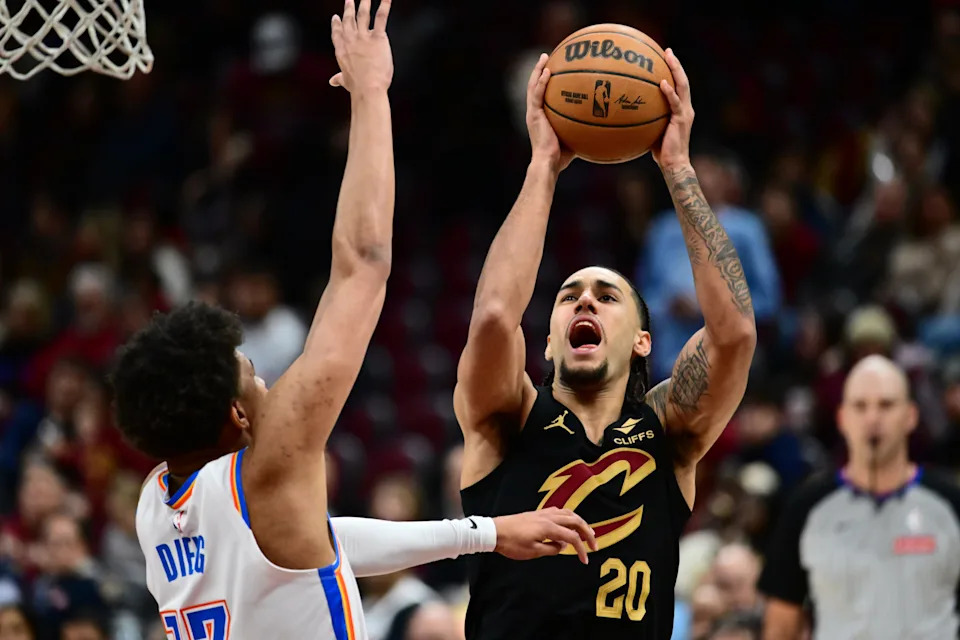 Cleveland Cavaliers guard Jaylon Tyson (20) drives to the basket as Oklahoma City Thunder forward Ousmane Dieng defends Jan. 19, 2026, in Cleveland.