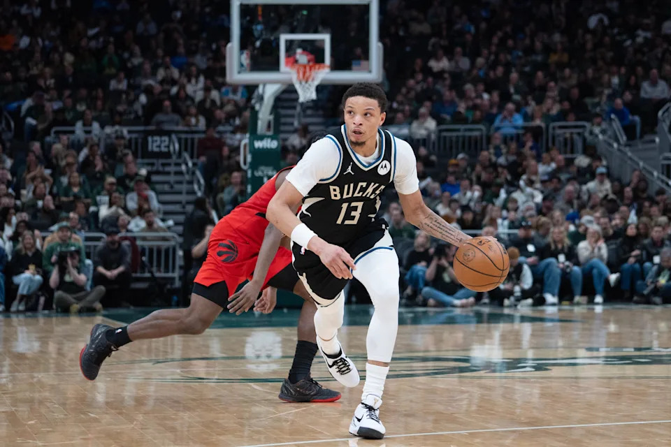 Milwaukee Bucks guard Ryan Rollins (13) dribbles toward the Toronto Raptors’ basket in the first half at Fiserv Forum on the afternoon of Feb. 22, 2026 in Milwaukee, Wisconsin.