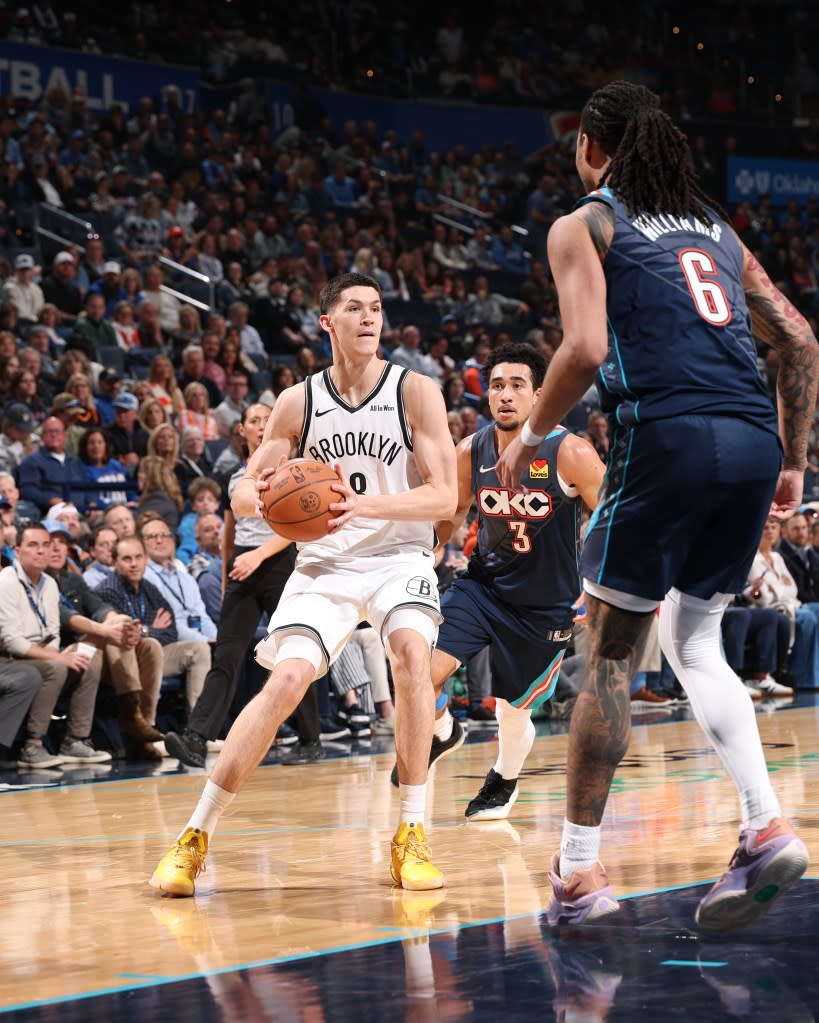 Egor Dëmin looks to pass the ball during the Nets’ loss to the Thunder on Feb. 20, 2026. NBAE via Getty Images