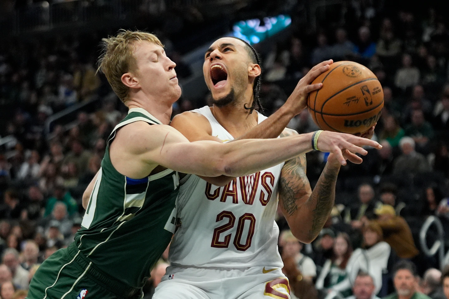 Porter, Rollins lead the Bucks past the short-handed Cavaliers, 118-116