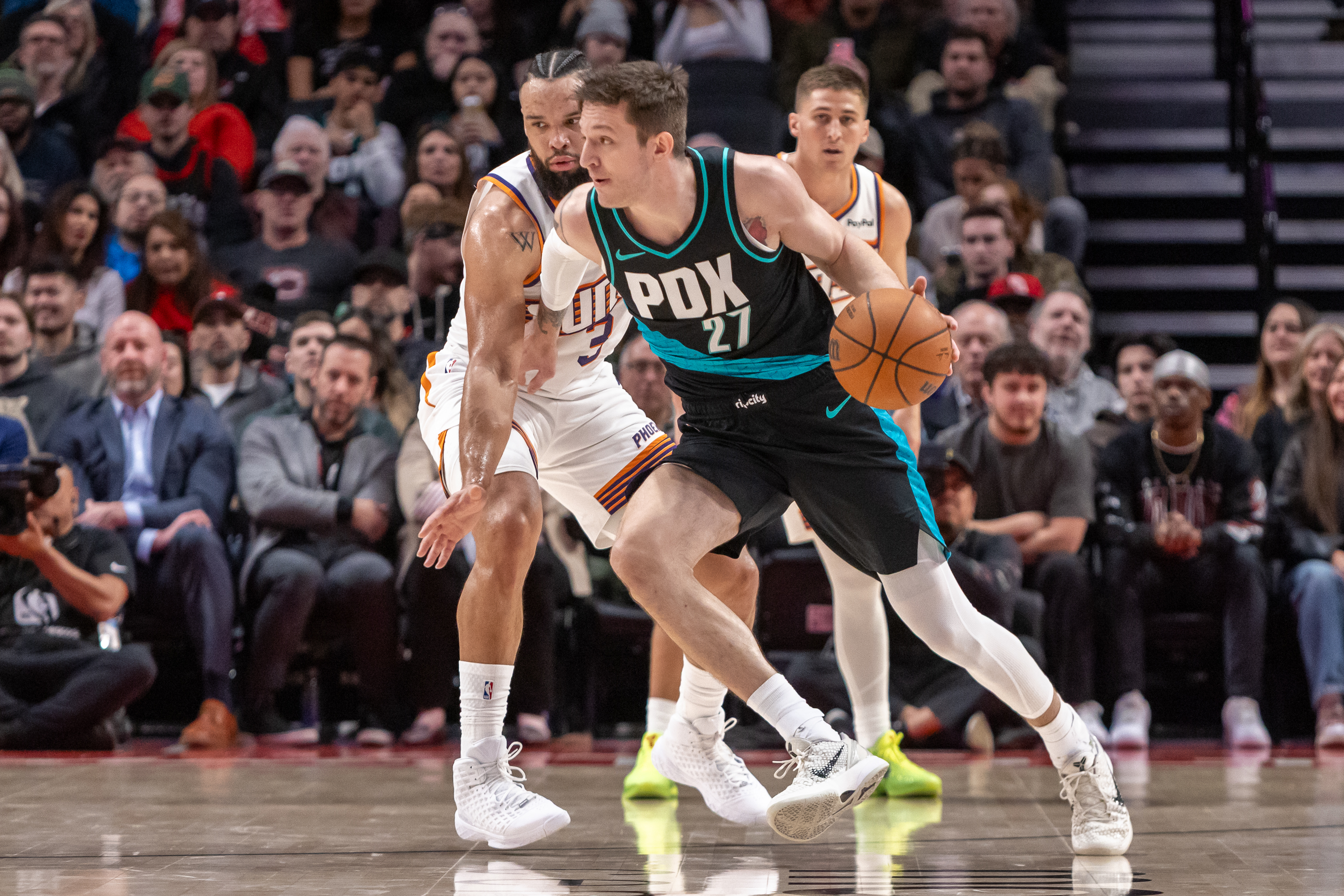 New Portland Trail Blazers guard Vit Krejci works against Phoenix Suns forward Dillon Brooks during an NBA game at Moda Center on Tuesday, Feb. 3, 2026.