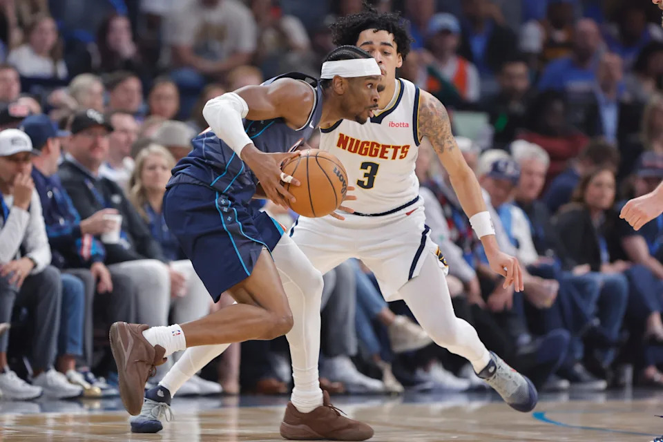 Feb 27, 2026; Oklahoma City, Oklahoma, USA; Oklahoma City Thunder guard Shai Gilgeous-Alexander (2) drives past Denver Nuggets guard Julian Strawther (3) during the first quarter at Paycom Center. Mandatory Credit: Alonzo Adams-Imagn Images