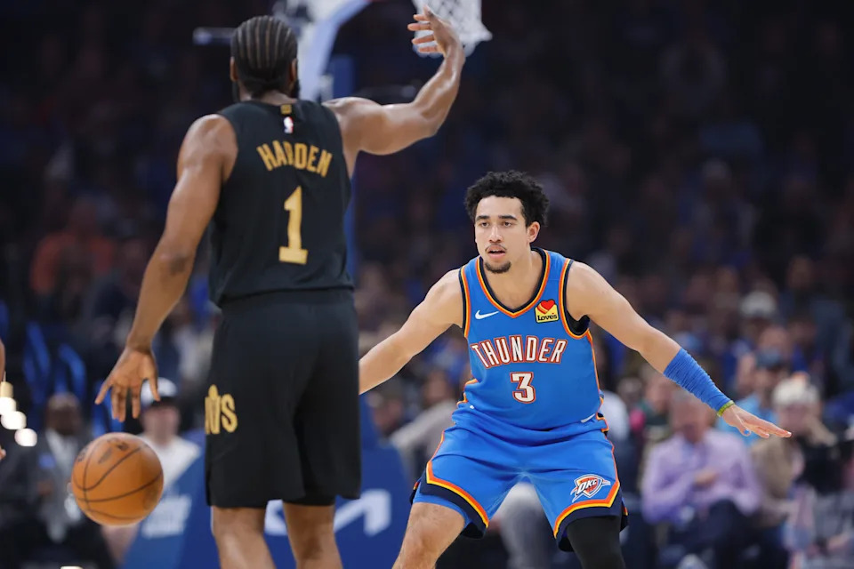 Feb 22, 2026; Oklahoma City, Oklahoma, USA; Oklahoma City Thunder guard Jared McCain (3) defends Cleveland Cavaliers guard James Harden (1) during the first half at Paycom Center. Mandatory Credit: Alonzo Adams-Imagn Images