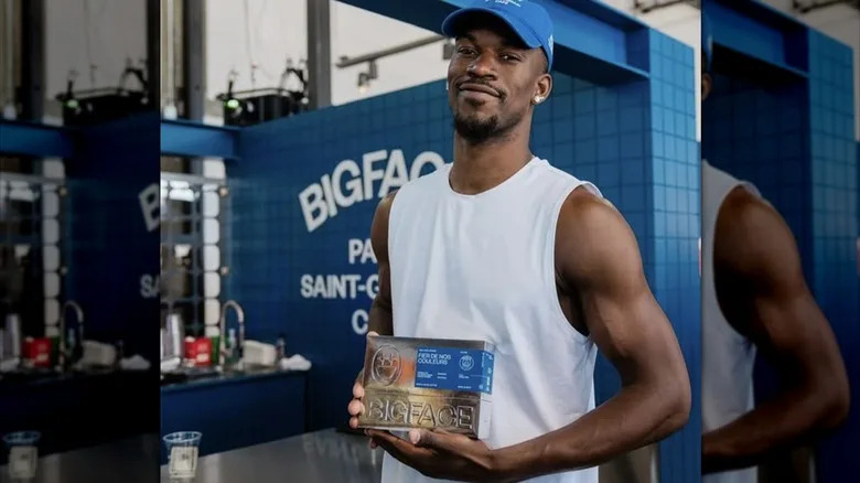Jimmy Butler posing with Bigface coffee at pop-up event