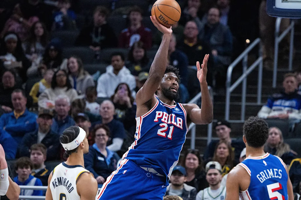Feb 24, 2026; Indianapolis, Indiana, USA; Philadelphia 76ers center/forward Joel Embiid (21) shoots the ball while Indiana Pacers guard/forward Andrew Nembhard (2) defends in the first half at Gainbridge Fieldhouse. Mandatory Credit: Trevor Ruszkowski-Imagn Images | Trevor Ruszkowski-Imagn Images